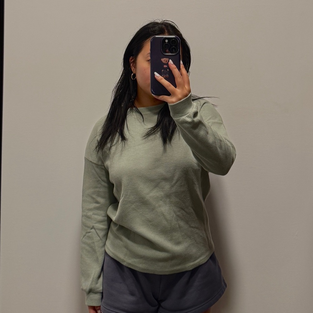 Mint/sage green long sleeve top.